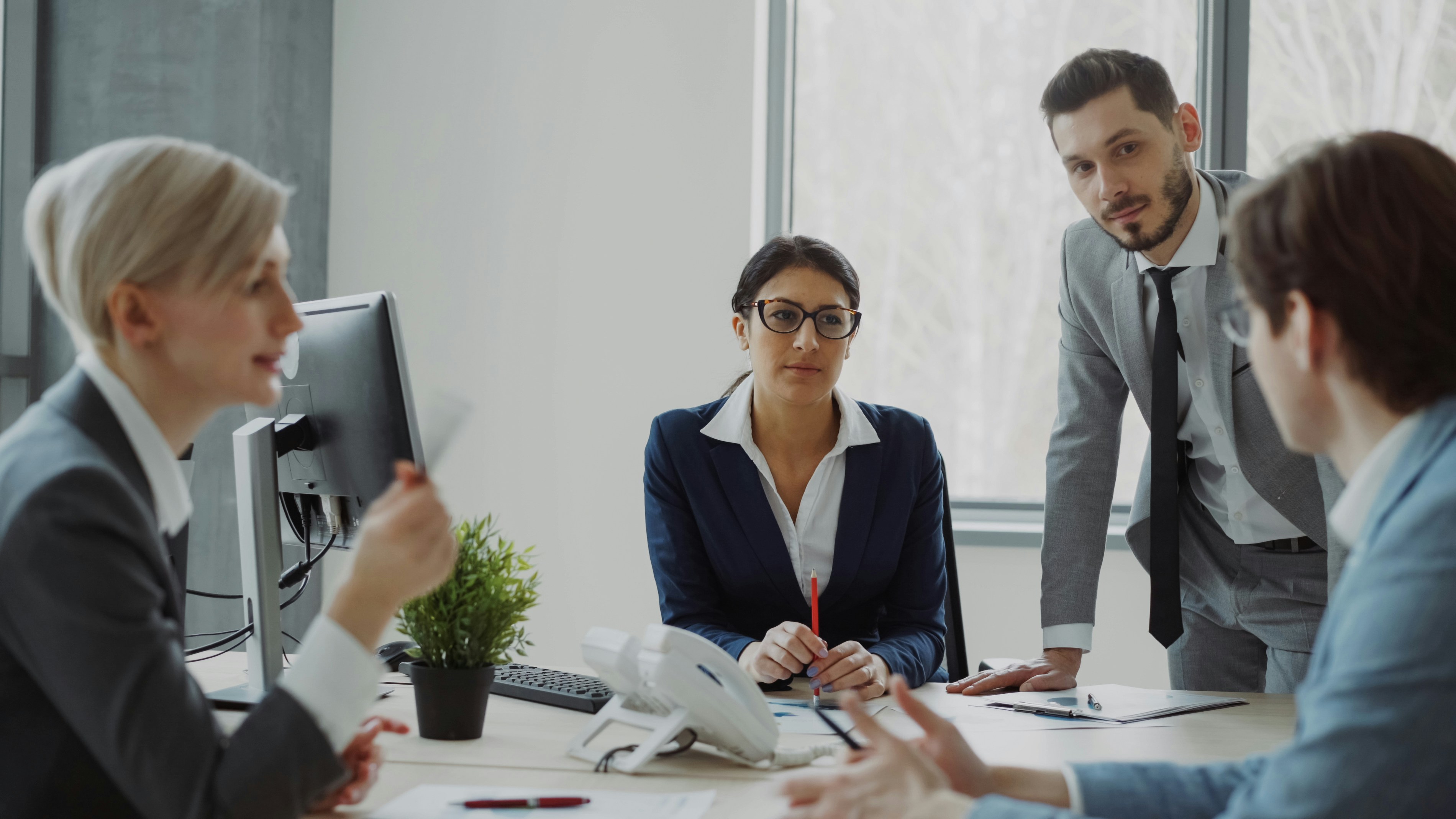 Equdos consultants working with a client team